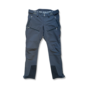 Grey Stellar Equipment women's softshell pants with zipper pockets, front view against a white background.