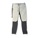 White and grey ON Running men's functional pants with a drawstring waist, front view against a white background.