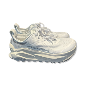 White Altra Olympus 6 women's running shoes in synthetic material, photographed from the side against a white background.