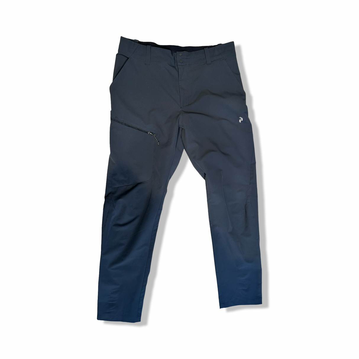 Black softshell functional pants from Peak Performance for men in size L, photographed from the front against a white background.