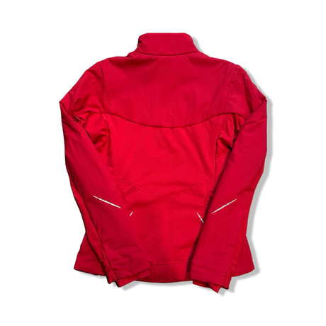 Red Arc'teryx women's windstopper jacket, back view against a white background.