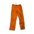 Orange Fjällräven women's functional trousers, front view against a white background.