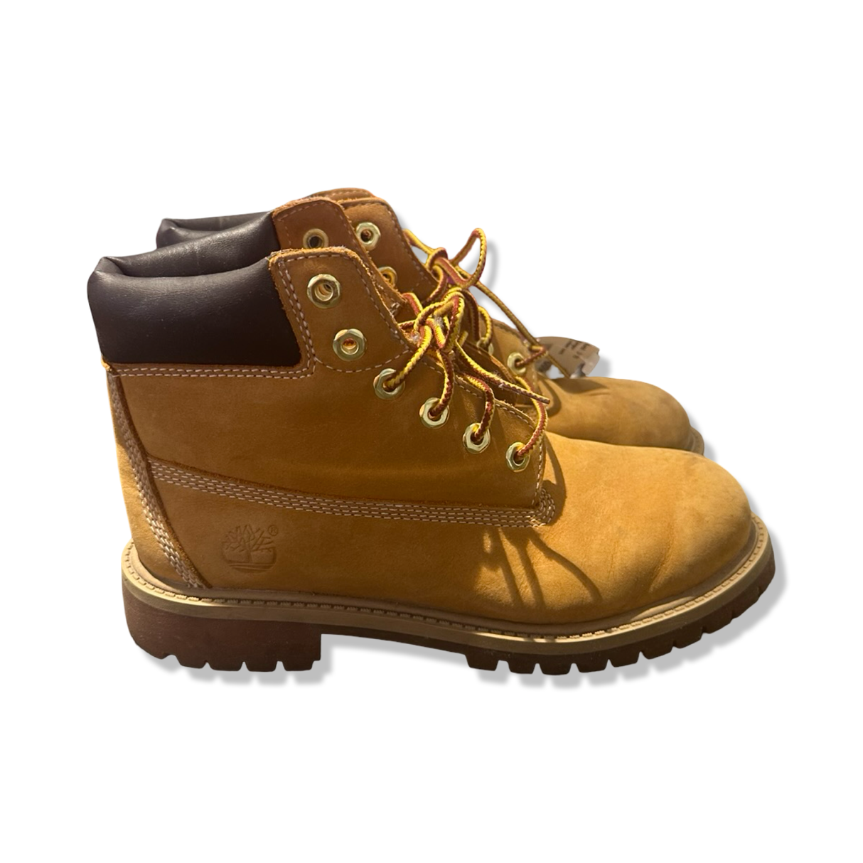Brown Timberland boots for women in size 35, featuring a chunky sole and padded collar against a white background.
