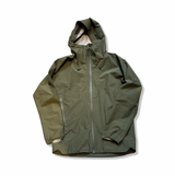 Green men's shell jacket from The Mountain Studio with a hood, front view against a white background.