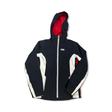 Navy blue and white Helly Hansen women's ski jacket with a hood, front view against a white background.