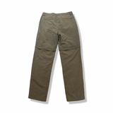 Back view of a green Craghoppers women's functional trousers against a white background.
