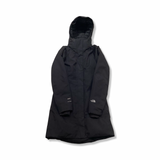 Black The North Face women's down jacket with hood, front view against a white background.
