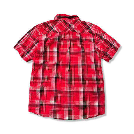 Back view of a red plaid Oakley men's shirt against a white background.