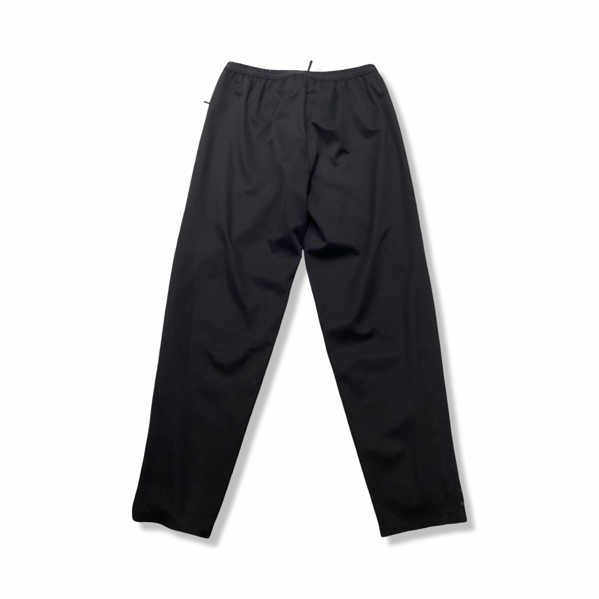 Back view of a black Nike women's training pants against a white background.