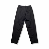Back view of a black Nike women's training pants against a white background.