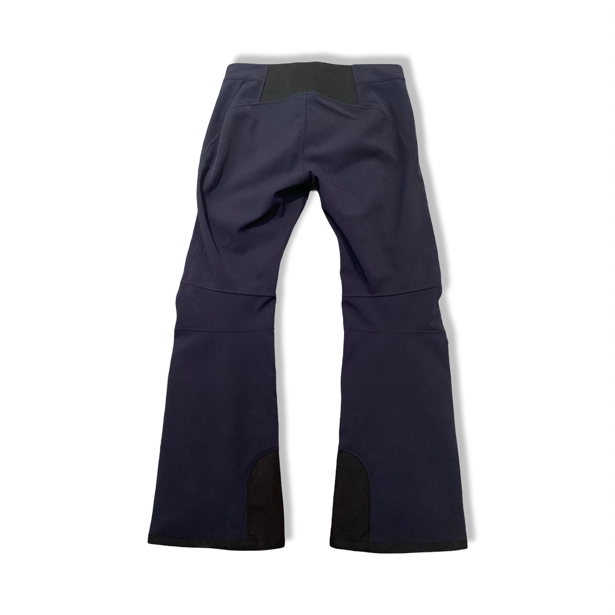 Dark blue Peak Performance women's ski pants, back view against a white background.