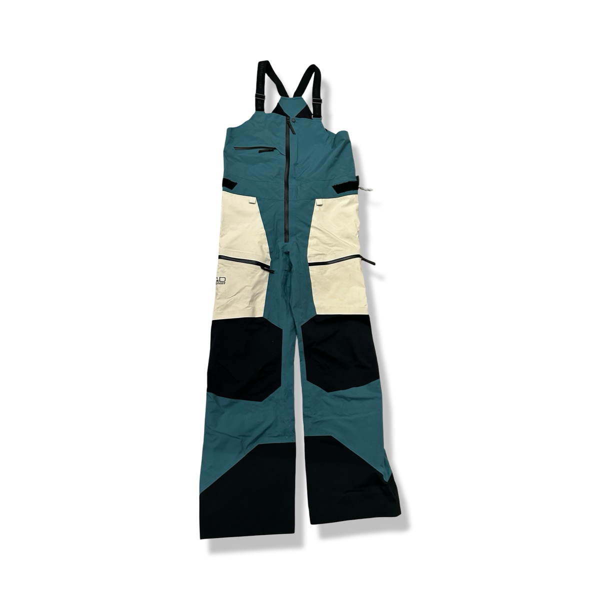 Blue and white Peak Performance women's bib shell pants, front view against a white background.