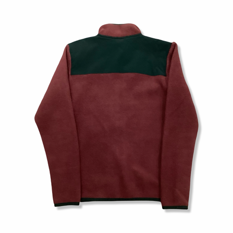 Back view of a maroon Peak Performance children's fleece cardigan against a white background.
