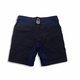 Back view of blue Sail Racing men's sailing shorts against a white background.