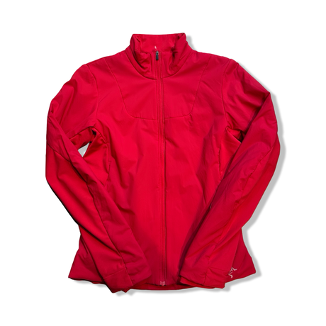 Red Arc'teryx women's windstopper jacket, front view against a white background.