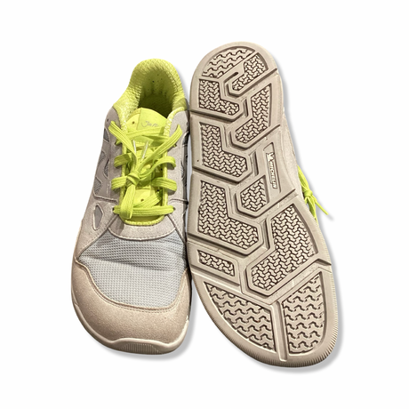 Grey and neon yellow Joe Nimble Addict men's sneakers, front view showing the upper and sole against a white background.