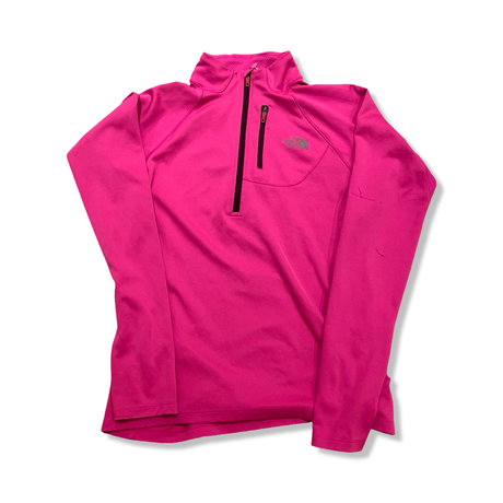Pink The North Face women's half-zip base layer top, front view against a white background.