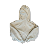 Offwhite hoodie från Lululemon i dammodell storlek XS, fotograferad bakifrån mot en vit bakgrund.