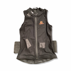 Black Salomon Junior Flexell junior's back protector in size M with a zipper, front view against a white background.
