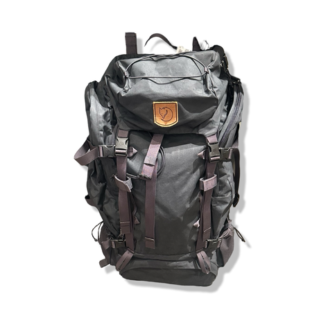 Grey Fjällräven 75L backpack with straps and buckles, front view against a white background.