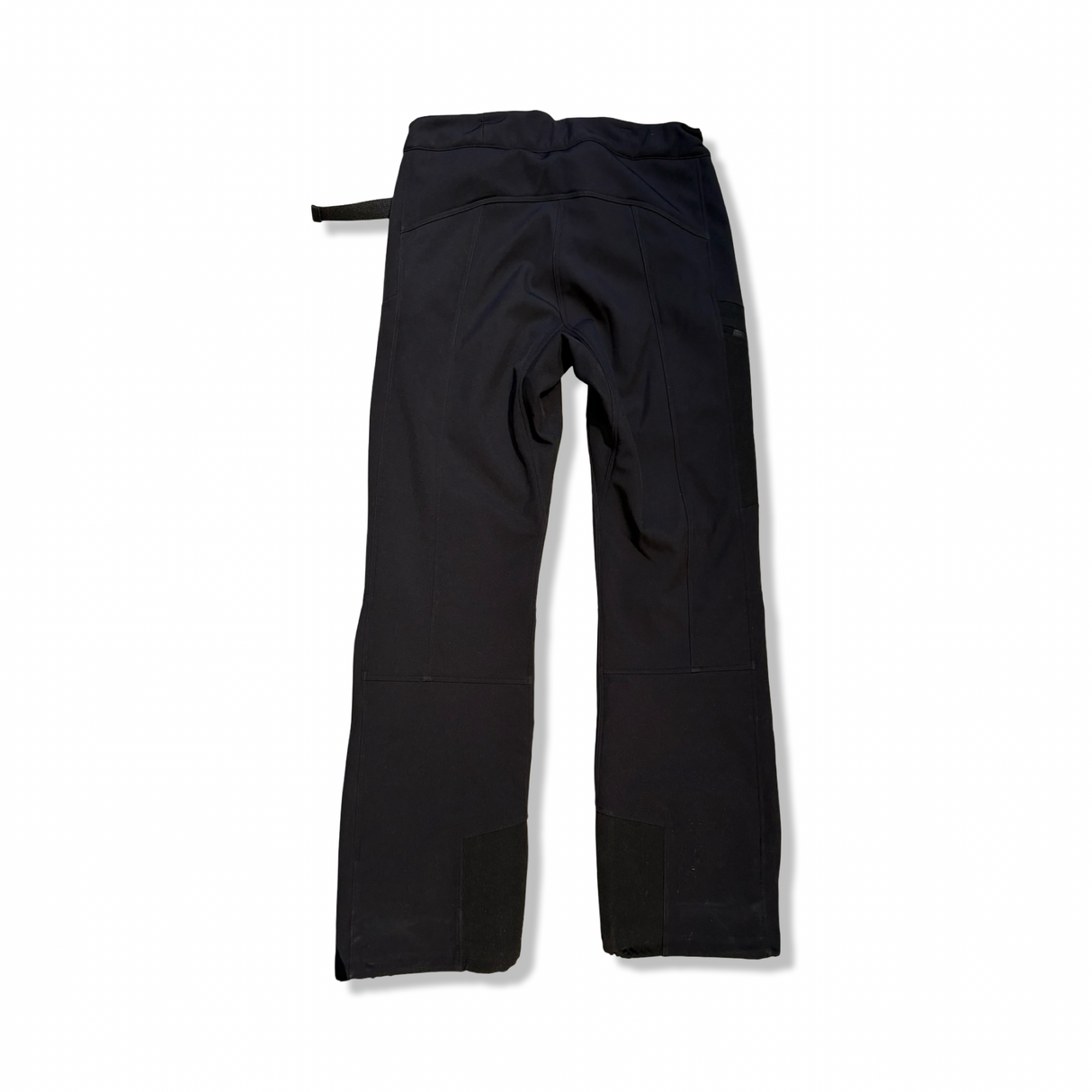 Black women's shell pants from The Mountain Studio, back view against a white background.