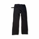 Black women's shell pants from The Mountain Studio, back view against a white background.
