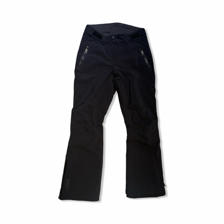 Black Helly Hansen women's ski pants, front view against a white background.