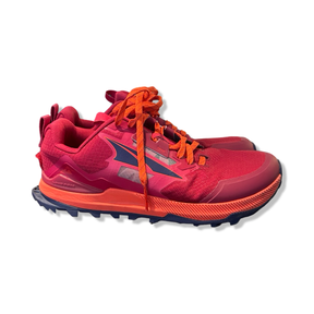 Pink Altra Lone Peak 7 women's hiking shoes, side view against a white background.