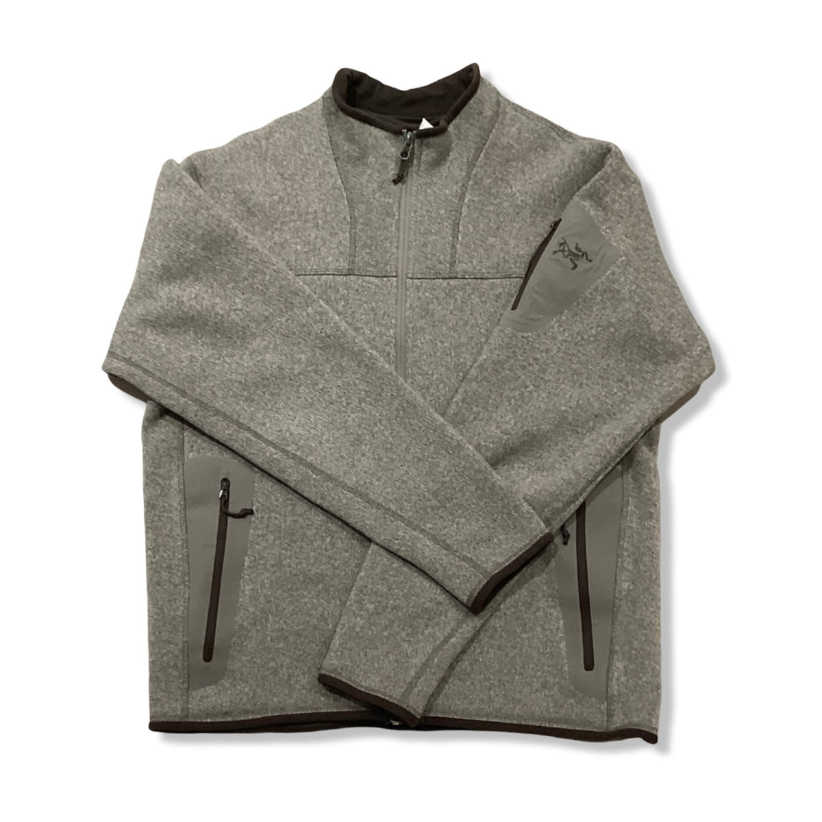Beige Arc'teryx men's fleece cardigan with zipper, front view against a white background.