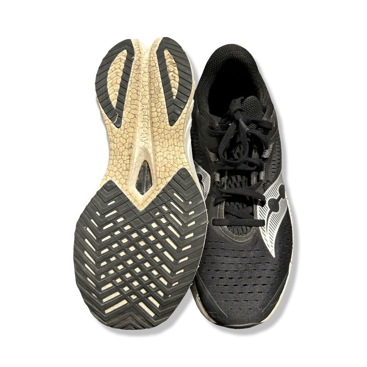 Black pair of Saucony Endorphin Speed 4 women's running shoes, shown from above with the sole facing up against a white background.