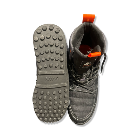 A pair of black Swims women's snow boots, viewed from above showing the sole pattern and the upper of the boot against a white background.
