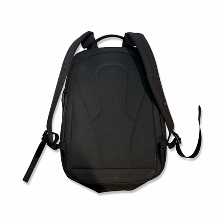 Black Lundhags 20L backpack with padded shoulder straps, back view against a white background.