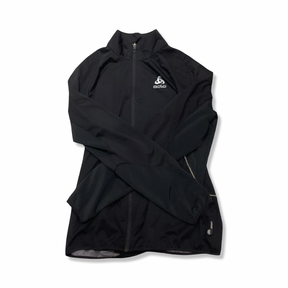 Black New Balance athletic jacket with a zipper, front view against a white background.