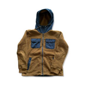 Mustard yellow men's fleece cardigan from Vaude with a hood and dark blue chest pockets, photographed against a white background.