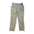 Beige funktionsbyxor från ON Track Pants IKON för herr, fotograferade framifrån mot en vit bakgrund.
