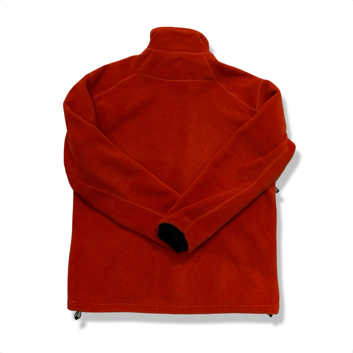 Back view of an orange Haglöfs women's fleece sweater against a white background.