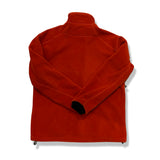 Back view of an orange Haglöfs women's fleece sweater against a white background.