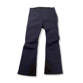 Dark blue Peak Performance women's ski pants, front view against a white background.