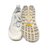White Altra Olympus 6 women's running shoes in size 38 1/2, shown from the front with the outsole against a white background.