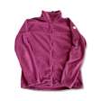 Women's raspberry red Fjällräven Ronja fleece cardigan with a zipper and sleeve logo, front view on white.