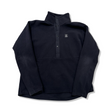 Black Haglöfs Mora mid women's fleece sweater with snap buttons, front view against a white background.