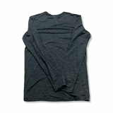 Back view of a green Ortovox men's base layer top against a white background.