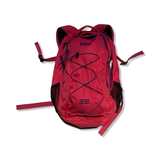 Rosa Helly Hansen 33L unisex-ryggsäck med snörning och logotyp, fotograferad framifrån mot vit bakgrund.