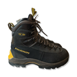 Grey Salomon men's suede hiking boots, side view against a white background.