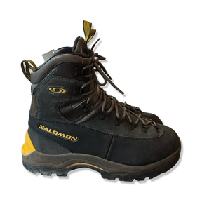 Grey Salomon men's suede hiking boots, side view against a white background.