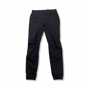 Black Ortovox women's pants with an elastic waistband, front view against a white background.