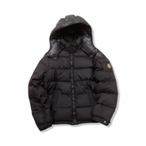 Black Moncler hooded down jacket with zipper, front view against a white background.
