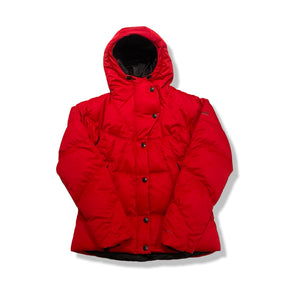 Red Columbia women's down jacket with a hood, front view against a white background.