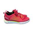 Pink and yellow Reebok Nanoweb women's running shoes with a white sole, side view against a white background.