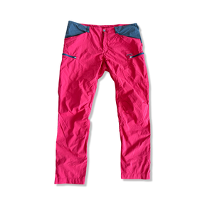 Red Bergans Utte men's hiking pants with dark grey details, front view against a white background.